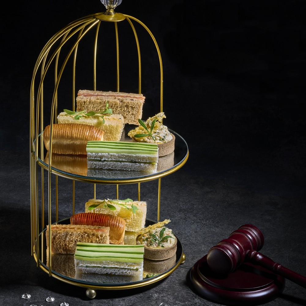 Indulge in a festive feast at The Rose Lounge! This delightful afternoon tea features seasonal treats, from gingerbread men to festive cakes.